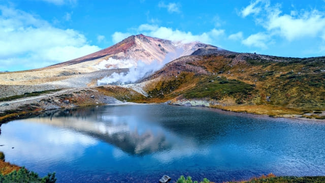 Sugatami-no-Ike reflecting Mt. Asahidake